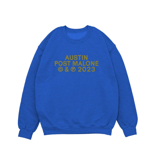Royal blue Post Malone Austin crewneck with gold album lettering printed on the chest front