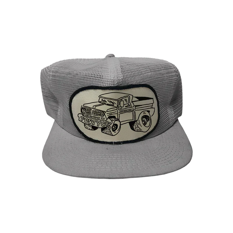 Grey Post Malone mesh trucker hat with an embroidered vintage pickup truck patch on the front