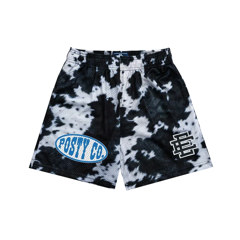 Black and white tie-dye Post Malone x Eric Emanuel shorts with a blue Posty Co logo on the leg