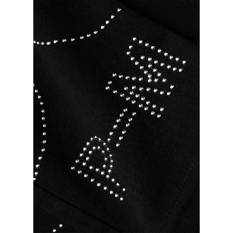 Close-up of the rhinestone stud detailing along the black Post Malone x Harley-Davidson denim pants