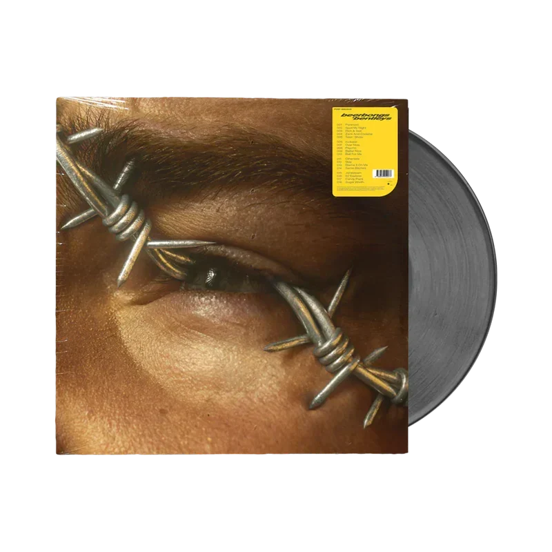 Post Malone Beerbongs & Bentleys vinyl with the barbed wire eye cover art and silver records