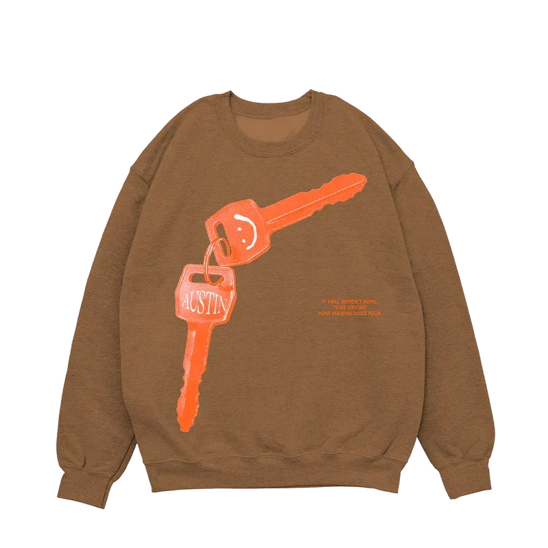 Brown Post Malone tan keys crewneck with an orange car key and keyring graphic across the chest